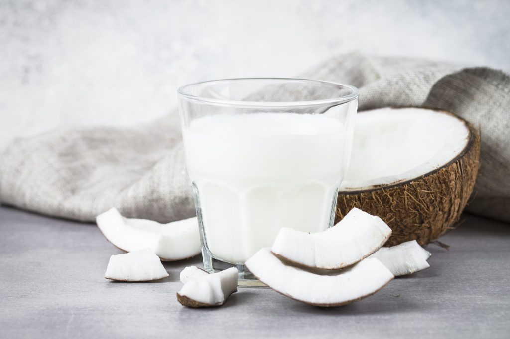 Coconut milk in glass, Vegan milk