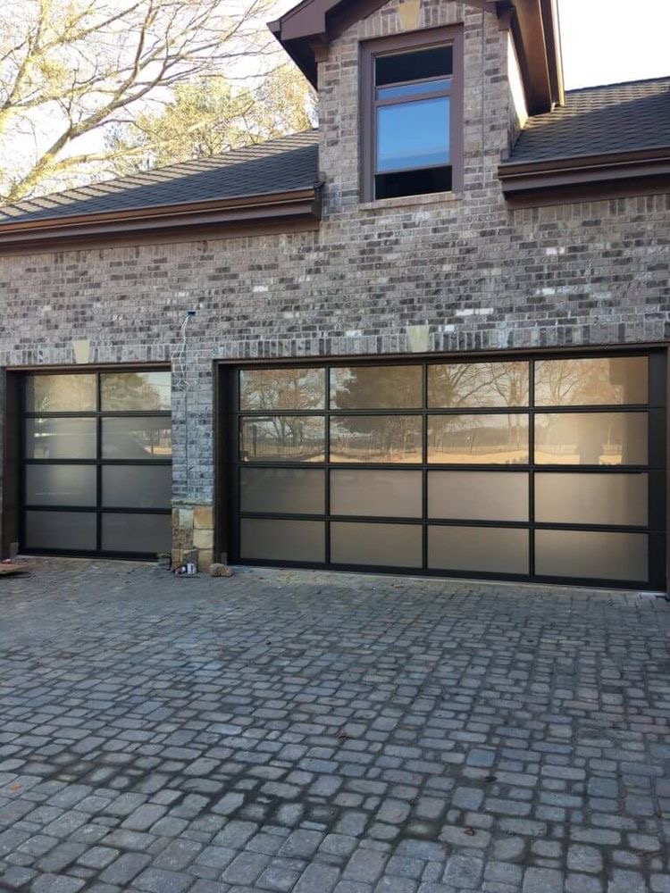 a full view modern glass luxury garage door