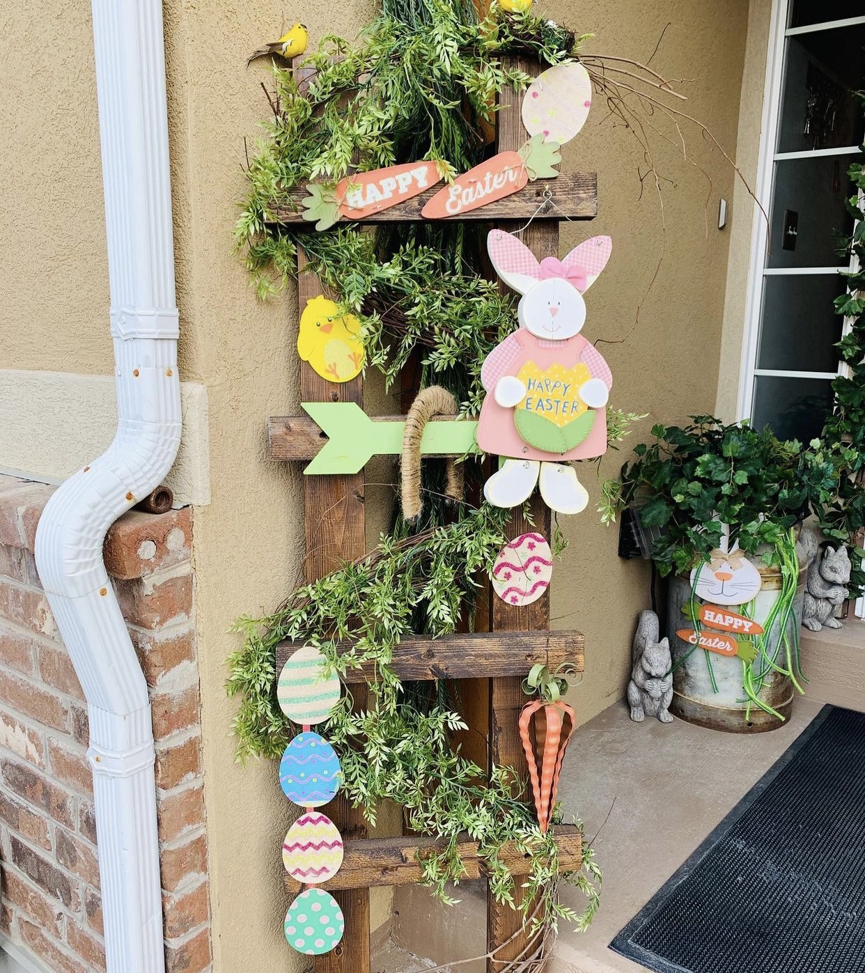 a ladder decorated with easter accesories