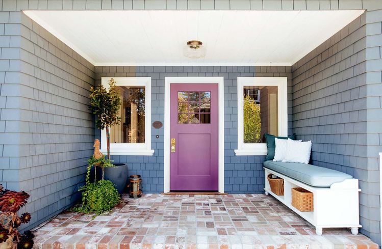 A light purple glass panel front door