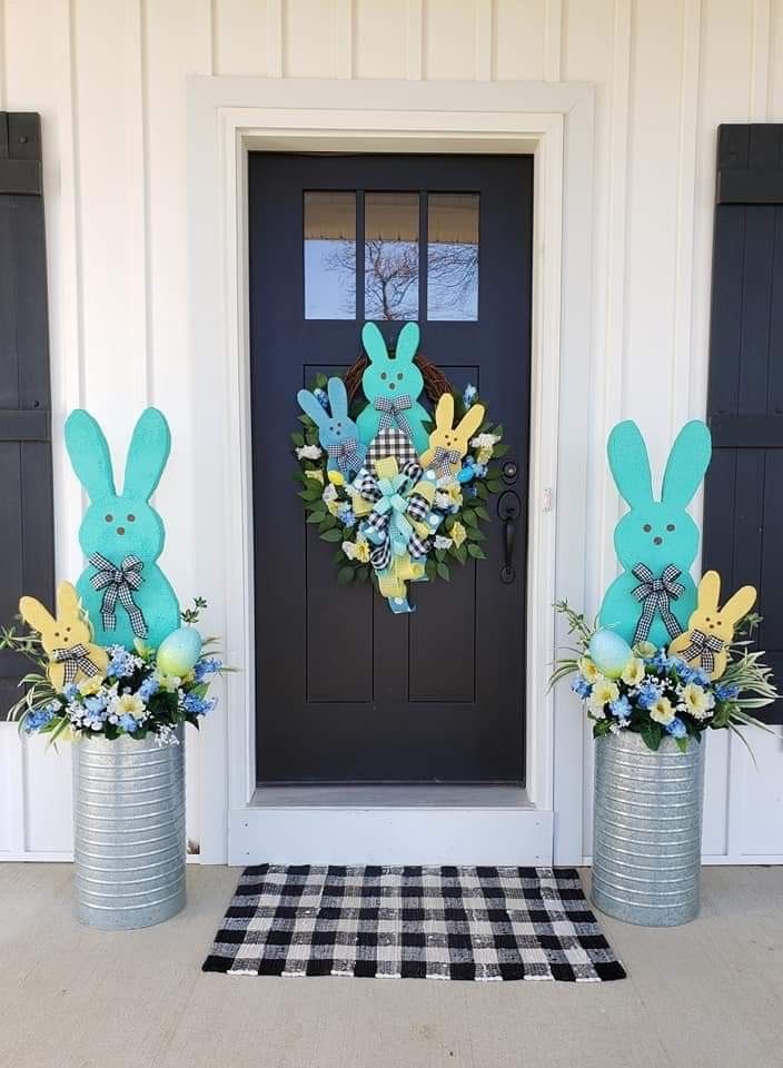 bright and beautiful easter bunnies on a wreath and improvised vases with spring flowers