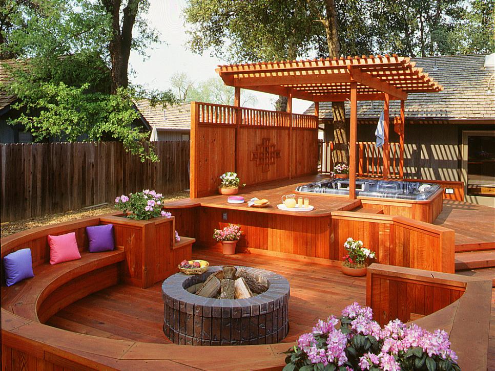 covered patio with hot tub