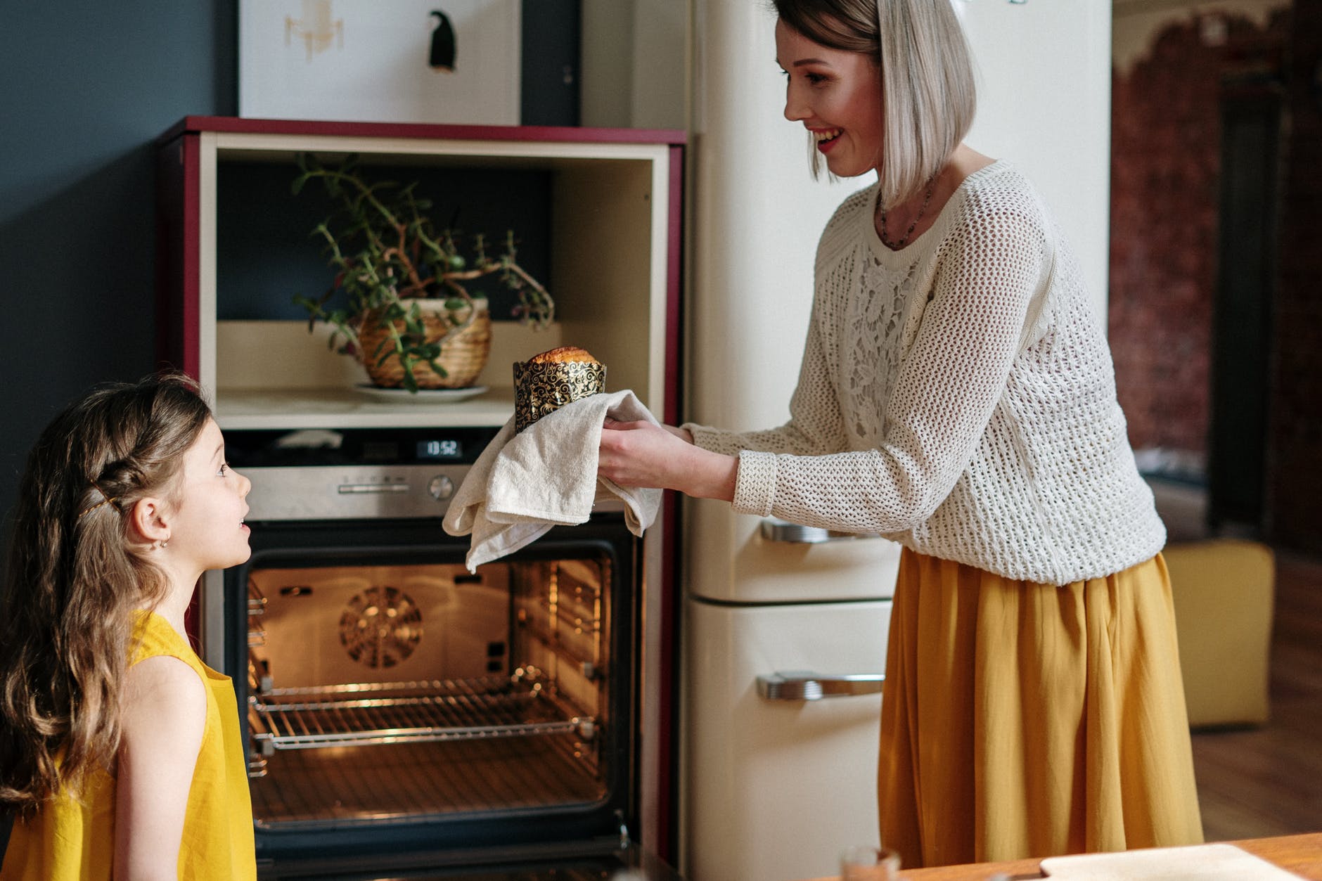 woman holding a freshly baked cake