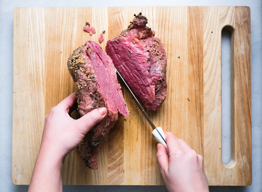 Can you cut a steak in half before grilling